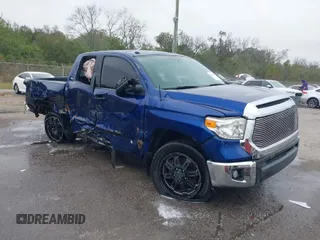 2015 Toyota Tundra SR with VIN 5TFRM5F18FX087851, listed as a IAAI auction lot 40425617 with 233,507 mi miles and . Bid and sale history available at DreamBid. Image 1.