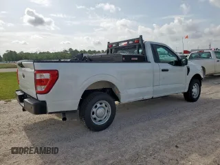 2022 Ford F-150 XL with VIN 1FTMF1C56NKD24644, listed as a Copart auction lot 63307315 with 64,704 mi miles and Salvage title. Bid and sale history available at DreamBid. Image 3.