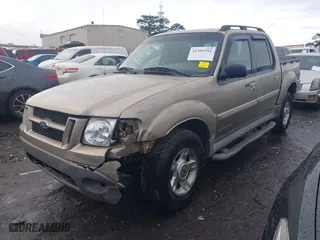 2002 Ford Explorer Sport Trac Value with VIN 1FMZU67E72UB56737, listed as a IAAI auction lot 41369591 with 145,077 mi miles. Bid and sale history available at carsss.com. Image 17.