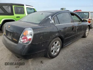 2002 Nissan Altima SL with VIN 1N4AL11D42C201779, listed as a Copart auction lot 76189094 with 65,147 mi miles and Salvage Title. Bid and sale history available at carsss.com. Image 3.