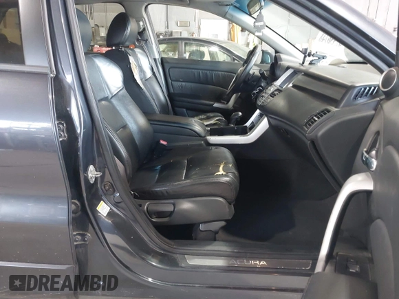 2007 Acura RDX with VIN 5J8TB18207A007085, listed as a IAAI auction lot 42556748 with 303,475 mi miles and . Bid and sale history available at DreamBid. Image 5.