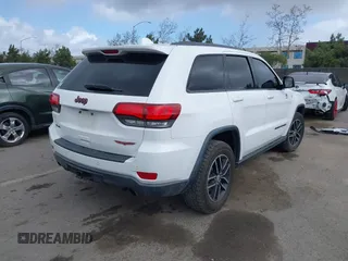 2018 Jeep Grand Cherokee Trailhawk with VIN 1C4RJFLT2JC137793, listed as a IAAI auction lot 41697299 with 149,100 mi miles and . Bid and sale history available at DreamBid. Image 4.