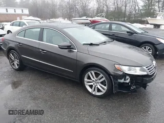 2013 Volkswagen CC Lux with VIN WVWRP7AN5DE554388, listed as a IAAI auction lot 41004116 with 162,457 mi miles. Bid and sale history available at carsss.com. Image 1.