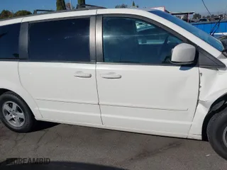 2013 Dodge Grand Caravan SXT with VIN 2C4RDGCG1DR550591, listed as a IAAI auction lot 40915068 with 157,614 mi miles. Bid and sale history available at carsss.com. Image 14.