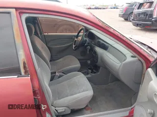 1997 Ford Escort LX with VIN 1FALP13P2VW392173, listed as a IAAI auction lot 41833271 with 123,991 mi miles. Bid and sale history available at carsss.com. Image 5.