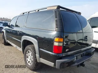 2004 Chevrolet Suburban LT z VIN 3GNFK16T44G206586, wystawiony jako IAAI lot #41480840 z przebiegiem Nie podano mil oraz . Historia ofert i sprzedaży dostępna na DreamBid. Obrazek 3.