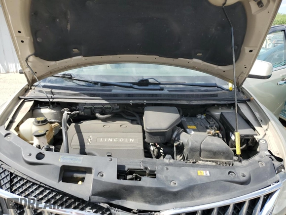 2011 Lincoln MKX z VIN 2LMDJ6JK9BBJ12766, wystawiony jako Copart lot #57494185 z przebiegiem 101 379 mil mil oraz Szkoda całkowita • Salvage title. Historia ofert i sprzedaży dostępna na DreamBid. Obrazek 12.