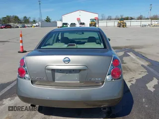 2005 Nissan Altima SE z VIN 1N4BL11D65C148642, wystawiony jako IAAI lot #42056330 z przebiegiem 81 328 mil mil oraz . Historia ofert i sprzedaży dostępna na DreamBid. Obrazek 16.