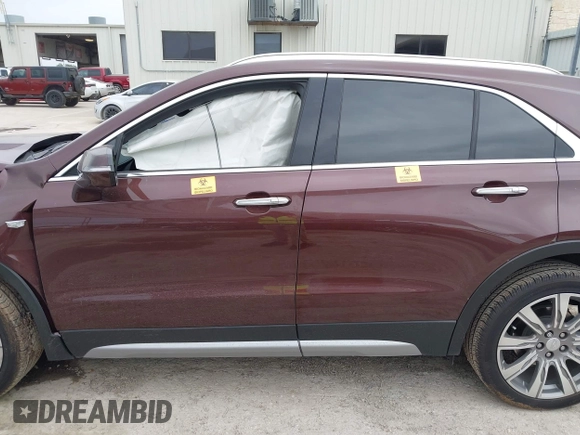 2022 Cadillac XT4 FWD Premium Luxury with VIN 1GYFZCR4XNF116845, listed as a IAAI auction lot 42128210 with 43,423 mi miles and . Bid and sale history available at DreamBid. Image 13.