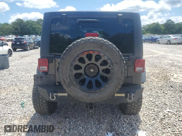 2015 Jeep Wrangler Unlimited Rubicon z VIN 1C4BJWFG2FL530863, wystawiony jako Copart lot #56345965 z przebiegiem 149 754 mil mil oraz Szkoda całkowita • Salvage title. Historia ofert i sprzedaży dostępna na DreamBid. Obrazek 6.