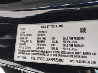 2023 Tesla Model 3 with VIN 5YJ3E1EAXPF623403, listed as a IAAI auction lot 41829543 with 29,414 mi miles and . Bid and sale history available at carsss.com. Image 9.