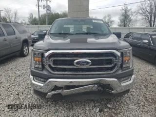 2023 Ford F-150 XL with VIN 1FTEW1EP8PKF20042, listed as a Copart auction lot 55163335 with 26,870 mi miles and Salvage title. Bid and sale history available at DreamBid. Image 5.
