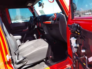 2015 Jeep Wrangler Unlimited Sahara with VIN 1C4BJWEG1FL748732, listed as a IAAI auction lot 41779308 with 109,986 mi miles. Bid and sale history available at carsss.com. Image 5.