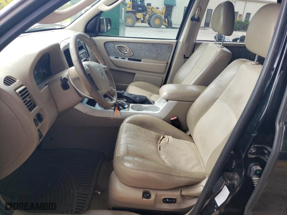 2007 Mercury Mariner with VIN 4M2CU39H97KJ03132, listed as a Copart auction lot 61134654 with 263,005 mi miles and Salvage Title. Bid and sale history available at carsss.com. Image 7.