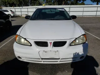 2004 Pontiac Grand Am SE1 with VIN 1G2NF52E84M575850, listed as a Copart auction lot 84547104 with 275,576 mi miles and Clean Title. Bid and sale history available at carsss.com. Image 5.