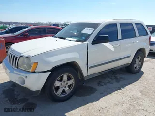 2007 Jeep Grand Cherokee Laredo with VIN 1J8GS48K97C597673, listed as a IAAI auction lot 41625207 with 150,365 mi miles. Bid and sale history available at carsss.com. Image 2.