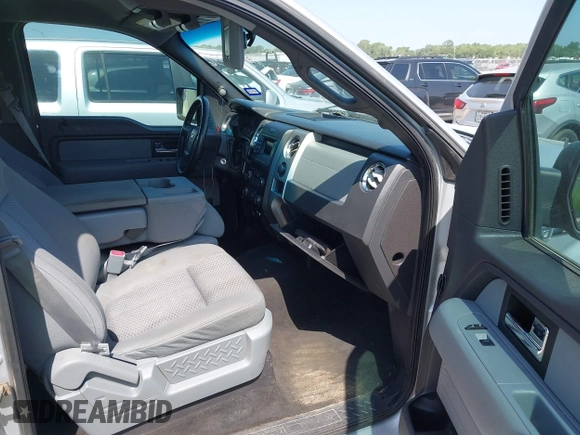 2013 Ford F-150 XL with VIN 1FTFW1CTXDKE02736, listed as a IAAI auction lot 42679036 with 152,895 mi miles and . Bid and sale history available at DreamBid. Image 5.