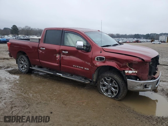 2017 Nissan Titan XD PRO-4X with VIN 1N6BA1F46HN568951, listed as a Copart auction lot 86619384 with 132,838 mi miles and Salvage Title. Bid and sale history available at carsss.com. Image 4.