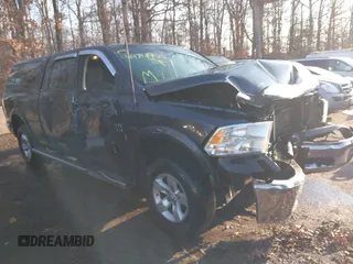 2015 Ram 1500 Big Horn with VIN 1C6RR7TM7FS569176, listed as a IAAI auction lot 41474950 with 220,742 mi miles and . Bid and sale history available at DreamBid. Image 1.