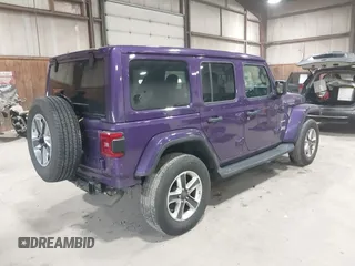 2023 Jeep Wrangler Sahara with VIN 1C4HJXEN9PW560958, listed as a IAAI auction lot 41980179 with 35,975 mi miles and . Bid and sale history available at DreamBid. Image 4.