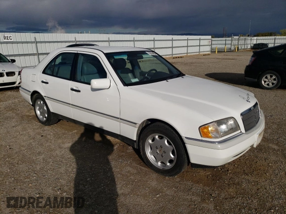 1995 Mercedes-Benz C with VIN WDBHA28E1SF151911, listed as a Copart auction lot 76814424 with 128,184 mi miles and Clean Title. Bid and sale history available at carsss.com. Image 4.