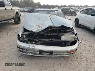 1994 Toyota Camry XLE with VIN JT2GK13E0R0039215, listed as a Copart auction lot 79532404 with 109,104 mi miles and Salvage Title. Bid and sale history available at carsss.com. Image 5.