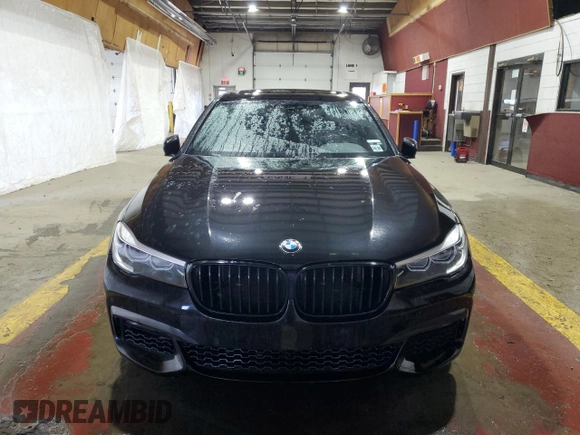2019 BMW 7 Series 740i xDrive with VIN WBA7E4C50KGV28708, listed as a Copart auction lot 55141895 with 130,925 mi miles and Clean title. Bid and sale history available at DreamBid. Image 5.