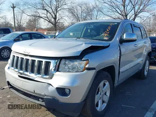 2011 Jeep Grand Cherokee Laredo z VIN 1J4RR4GG2BC511289, wystawiony jako IAAI lot #41240075 z przebiegiem 88 140 mil mil oraz . Historia ofert i sprzedaży dostępna na DreamBid. Obrazek 17.