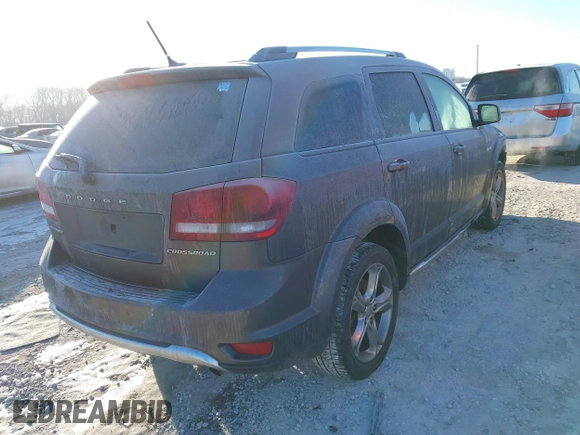 2016 Dodge Journey Crossroad Plus z VIN 3C4PDCGB0GT165975, wystawiony jako IAAI lot #41368904 z przebiegiem 101 835 mil mil oraz . Historia ofert i sprzedaży dostępna na DreamBid. Obrazek 4.
