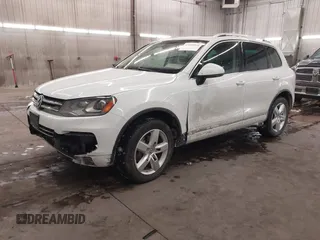 2013 Volkswagen Touareg Lux with VIN WVGEF9BP5DD011511, listed as a IAAI auction lot 41608840 with 167,350 mi miles and . Bid and sale history available at DreamBid. Image 18.