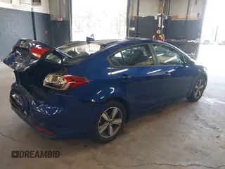 2018 Kia Forte LX with VIN 3KPFL4A73JE234727, listed as a IAAI auction lot 42144221 with 105,300 mi miles and . Bid and sale history available at DreamBid. Image 4.