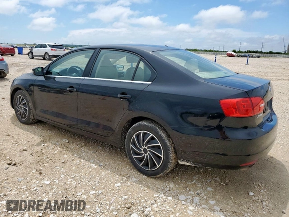 2013 Volkswagen Jetta SE with VIN 3VWDX7AJ3DM434233, listed as a Copart auction lot 60697485 with 74,333 mi miles and Salvage title. Bid and sale history available at DreamBid. Image 2.