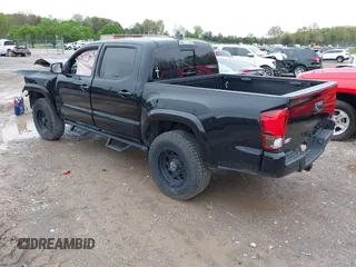 2018 Toyota Tacoma SR with VIN 3TMCZ5AN0JM136198, listed as a IAAI auction lot 41962668 with 71,813 mi miles. Bid and sale history available at carsss.com. Image 3.
