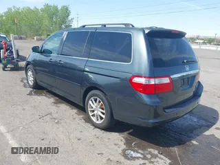 2005 Honda Odyssey TOURING with VIN 5FNRL38855B091754, listed as a IAAI auction lot 42131326 with 258,635 mi miles. Bid and sale history available at carsss.com. Image 3.
