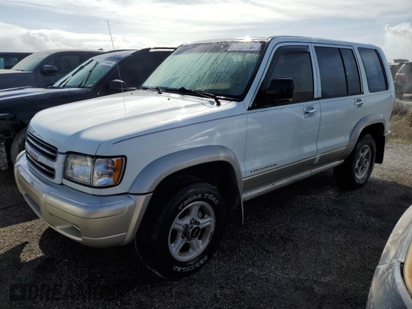 2000 Isuzu Trooper S z VIN JACDS58XXY7J11716, wystawiony jako Copart lot #76685304 z przebiegiem 92 828 mil mil oraz Nie do naprawy. Historia ofert i sprzedaży dostępna na DreamBid. Obrazek 1.