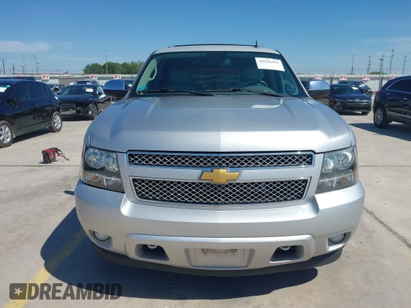 2013 Chevrolet Tahoe LT with VIN 1GNSCBE07DR164486, listed as a IAAI auction lot 42216421 with 220,395 mi miles and . Bid and sale history available at DreamBid. Image 12.