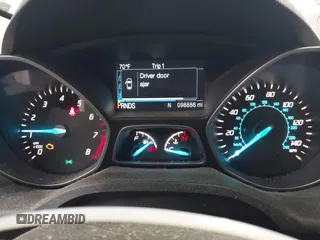 2014 Ford Escape SE with VIN 1FMCU9G99EUC15477, listed as a IAAI auction lot 42147162 with 98,886 mi miles and . Bid and sale history available at DreamBid. Image 7.