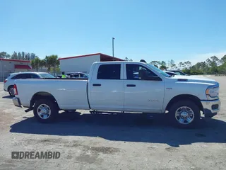 2021 Ram 2500 Tradesman z VIN 3C6UR4HJ3MG501081, wystawiony jako IAAI lot #41853135 z przebiegiem 70 421 mil mil oraz . Historia ofert i sprzedaży dostępna na DreamBid. Obrazek 13.