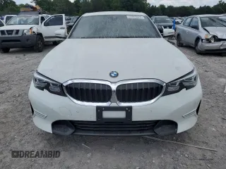 2020 BMW 3 Series 330i with VIN 3MW5R1J01L8B13902, listed as a Copart auction lot 59869625 with 54,992 mi miles and Salvage title. Bid and sale history available at DreamBid. Image 5.