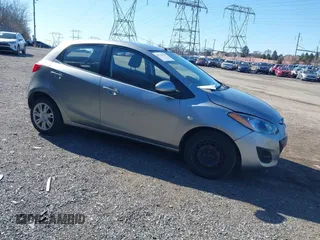 2014 Mazda 2 Sport with VIN JM1DE1KZ1E0182657, listed as a IAAI auction lot 41760507 with 148,166 mi miles. Bid and sale history available at carsss.com. Image 1.