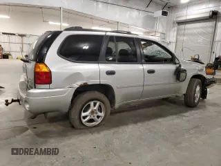 2007 GMC Envoy SLE z VIN 1GKDT13S172300399, wystawiony jako Copart lot #56978495 z przebiegiem 239 862 mil mil oraz Nie do naprawy. Historia ofert i sprzedaży dostępna na DreamBid. Obrazek 3.