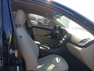 2014 Kia Optima LX with VIN 5XXGM4A71EG270298, listed as a IAAI auction lot 41839869 with 126,209 mi miles. Bid and sale history available at carsss.com. Image 5.