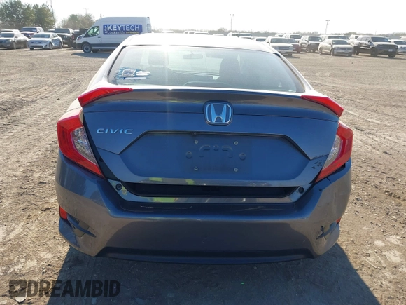 2016 Honda Civic Sedan LX with VIN 2HGFC2F55GH546980, listed as a IAAI auction lot 41378567 with 145,091 mi miles. Bid and sale history available at carsss.com. Image 16.