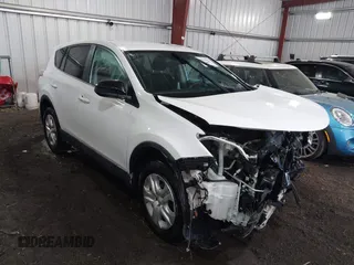 2018 Toyota RAV4 LE with VIN 2T3ZFREV6JW505455, listed as a IAAI auction lot 42052207 with 122,745 mi miles. Bid and sale history available at carsss.com. Image 1.