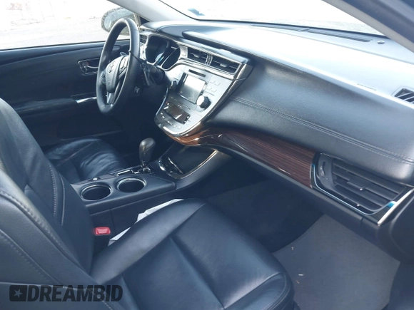 2013 Toyota Avalon XLE with VIN 4T1BK1EB8DU046429, listed as a IAAI auction lot 42092348 with 344,339 mi miles and . Bid and sale history available at DreamBid. Image 5.