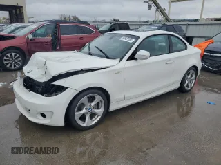 2012 BMW 1 Series 128i with VIN WBAUP7C52CVP23334, listed as a Copart auction lot 80547784 with 87,609 mi miles and Salvage title. Bid and sale history available at DreamBid. Image 1.