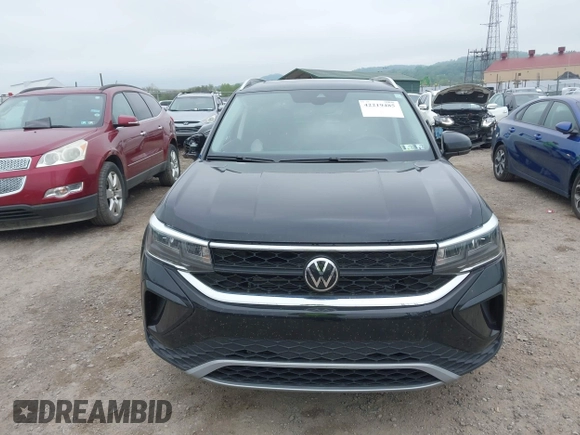 2023 Volkswagen Taos SE z VIN 3VVNX7B22PM330188, wystawiony jako IAAI lot #42219485 z przebiegiem 26 166 mil mil oraz . Historia ofert i sprzedaży dostępna na DreamBid. Obrazek 12.
