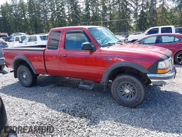 1998 Ford Ranger XL with VIN 1FTZR15XXWTA56110, listed as a IAAI auction lot 42702273 with 228,015 mi miles and . Bid and sale history available at DreamBid. Image 13.