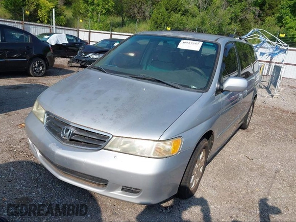 2003 Honda Odyssey EX z VIN 5FNRL18613B111952, wystawiony jako IAAI lot #40852383 z przebiegiem Nie podano mil oraz . Historia ofert i sprzedaży dostępna na DreamBid. Obrazek 2.