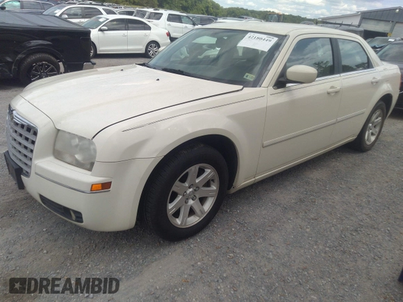 2005 Chrysler 300 Touring with VIN 2C3AA53G75H663208, listed as a IAAI auction lot 42180449 with 353,034 mi miles and . Bid and sale history available at carsss.com. Image 2.